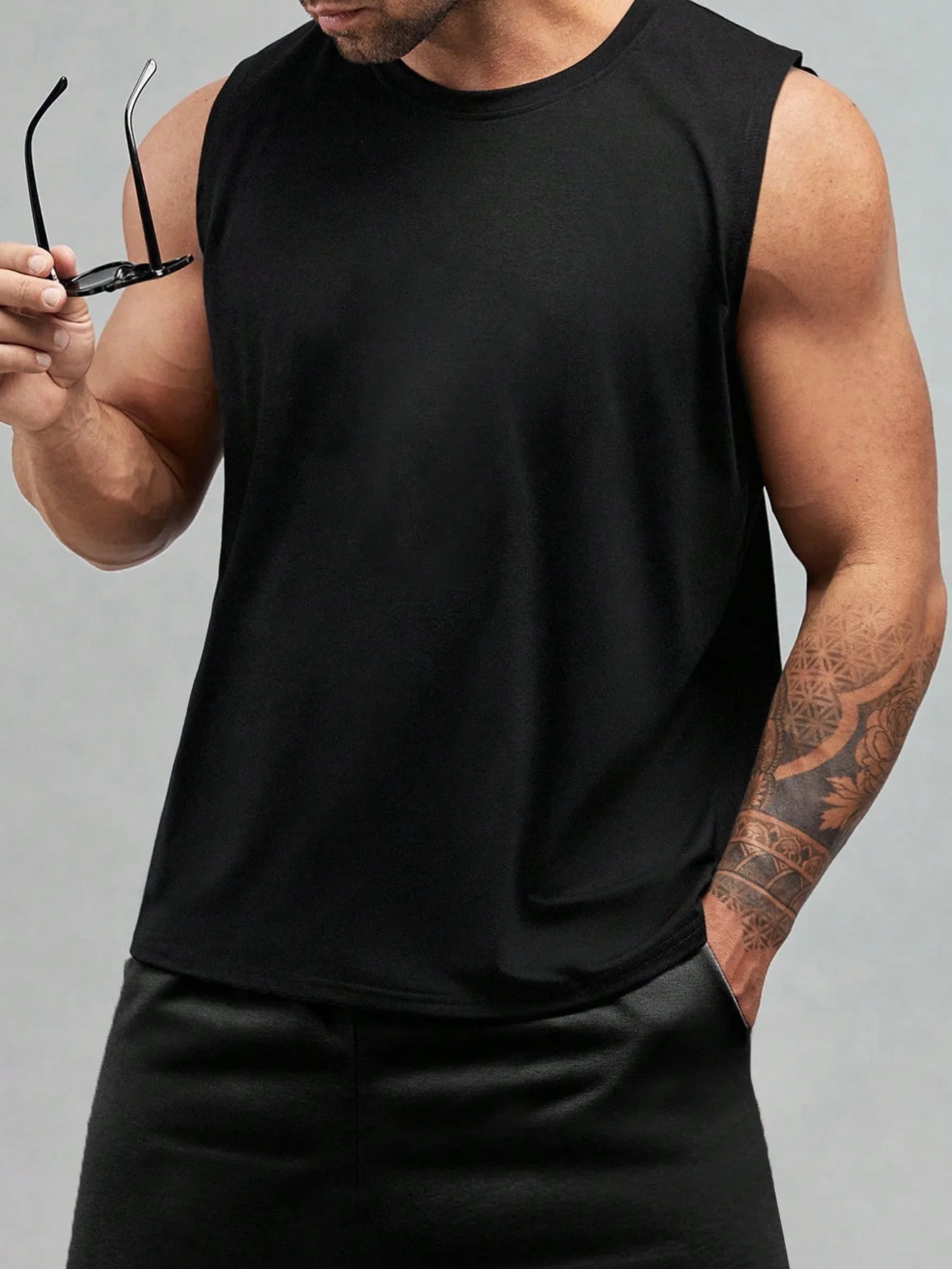 Men's Casual Solid Color Sleeveless Round Neck Top - Slight Stretch Fabric