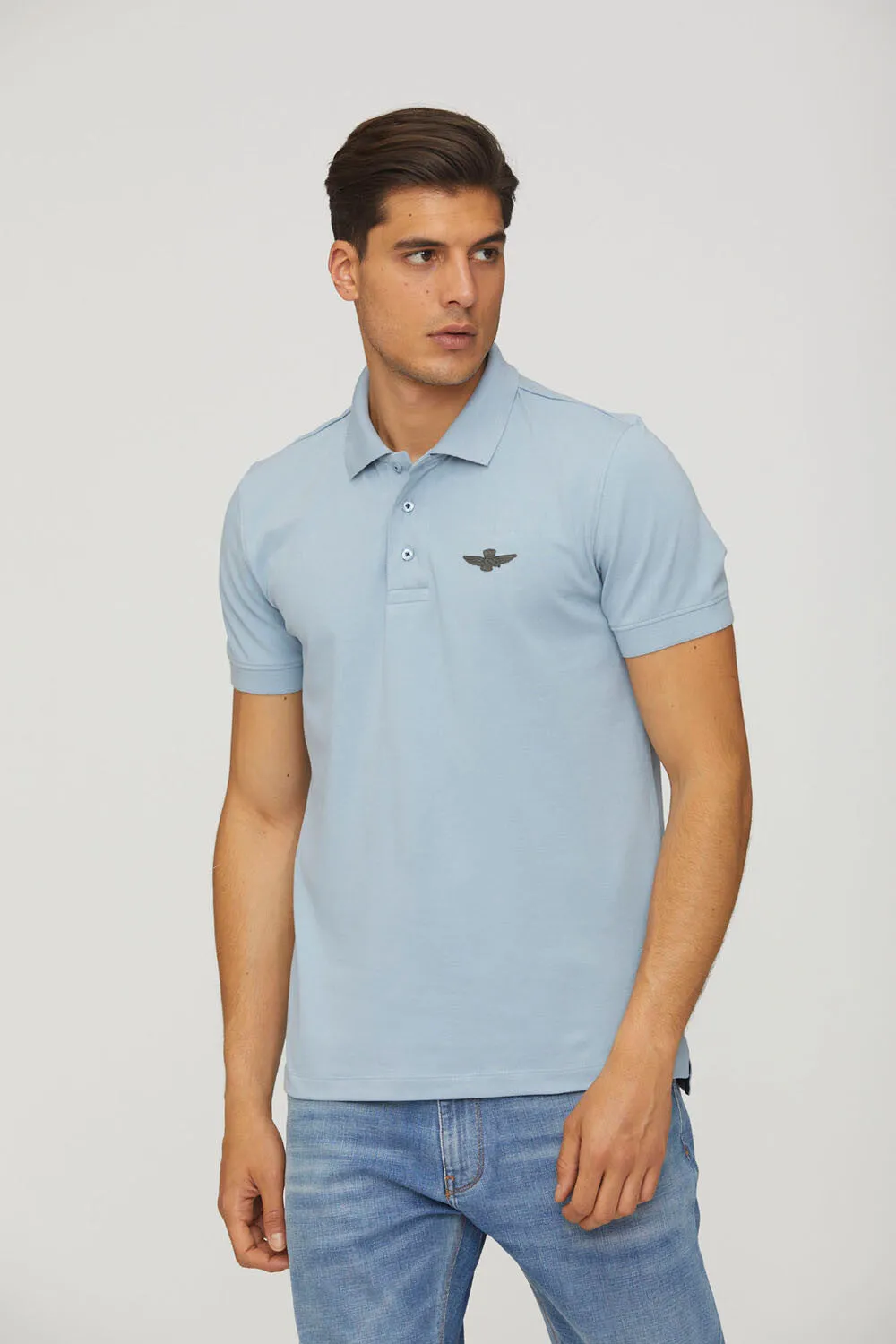 Slim fit polo with faux leather details